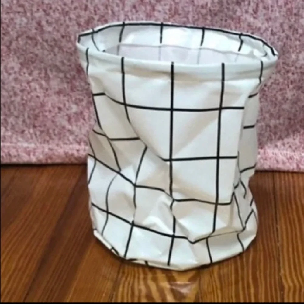5 collapsible bins (2 large white/black) (3 small white plaid bin)